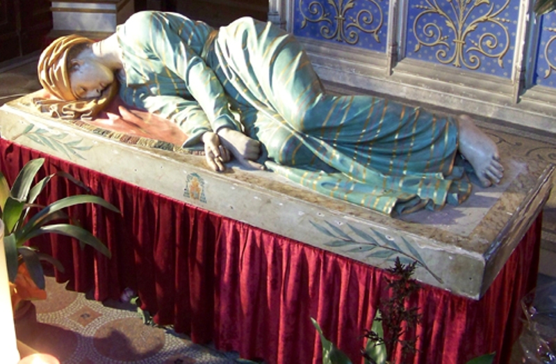 Representación de Santa Cecilia, según fue encontrado su cuerpo después de haber sido decapitada (Especial)