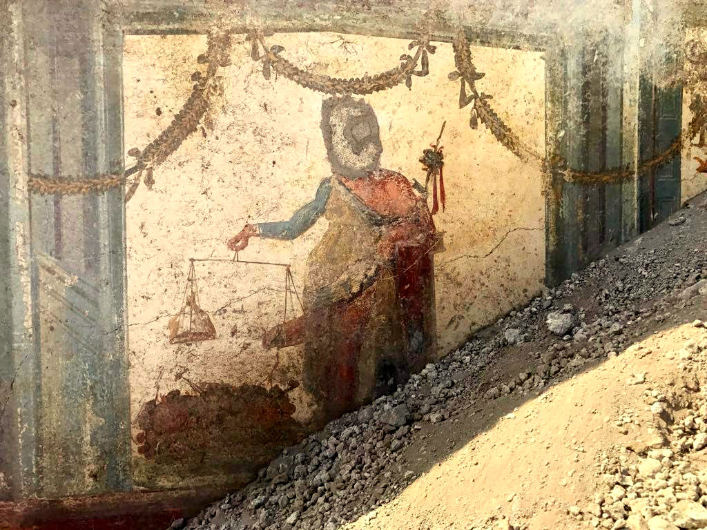 Príapo, dios menor de la mitología grecolatina, retratado en un fresco. (EFE)
