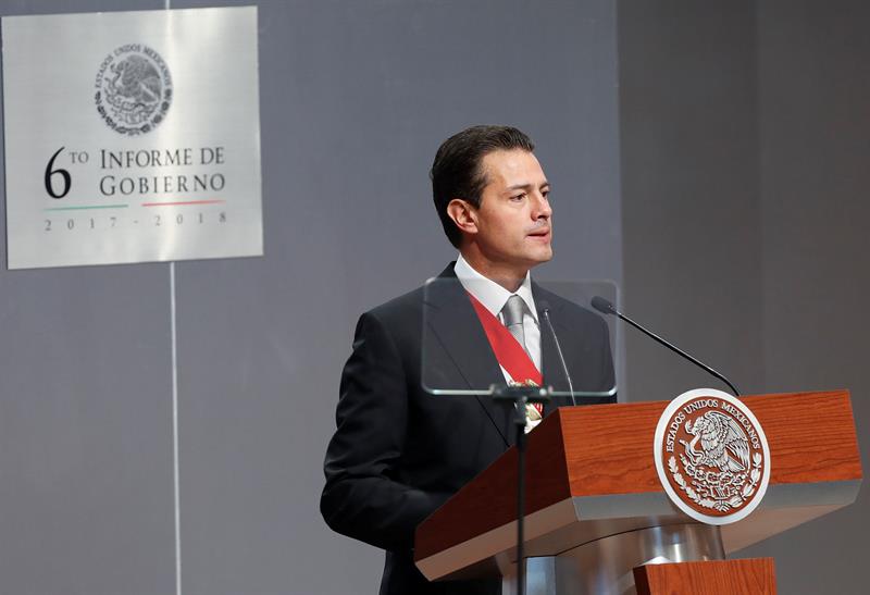 Peña Nieto dijo que durante su gobierno se buscó trabajar para todos, por ello dijo, se combatió la pobreza desde el inicio  de su gestión. (EFE)