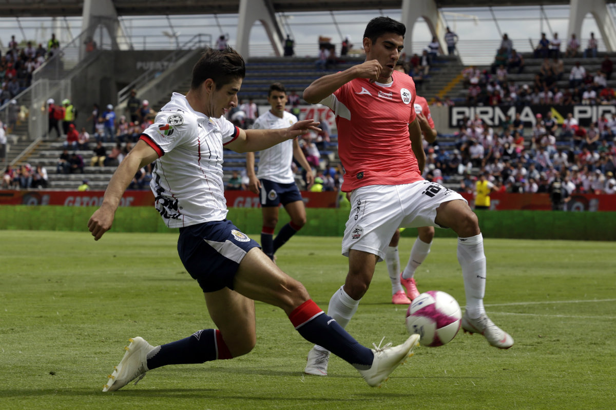 Lobos BUAP divide unidades en duelo ante Chivas (Imago7)
