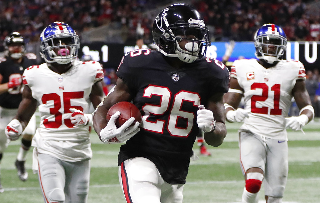 Tevin Coleman anotó uno de los touchdowns (AP)