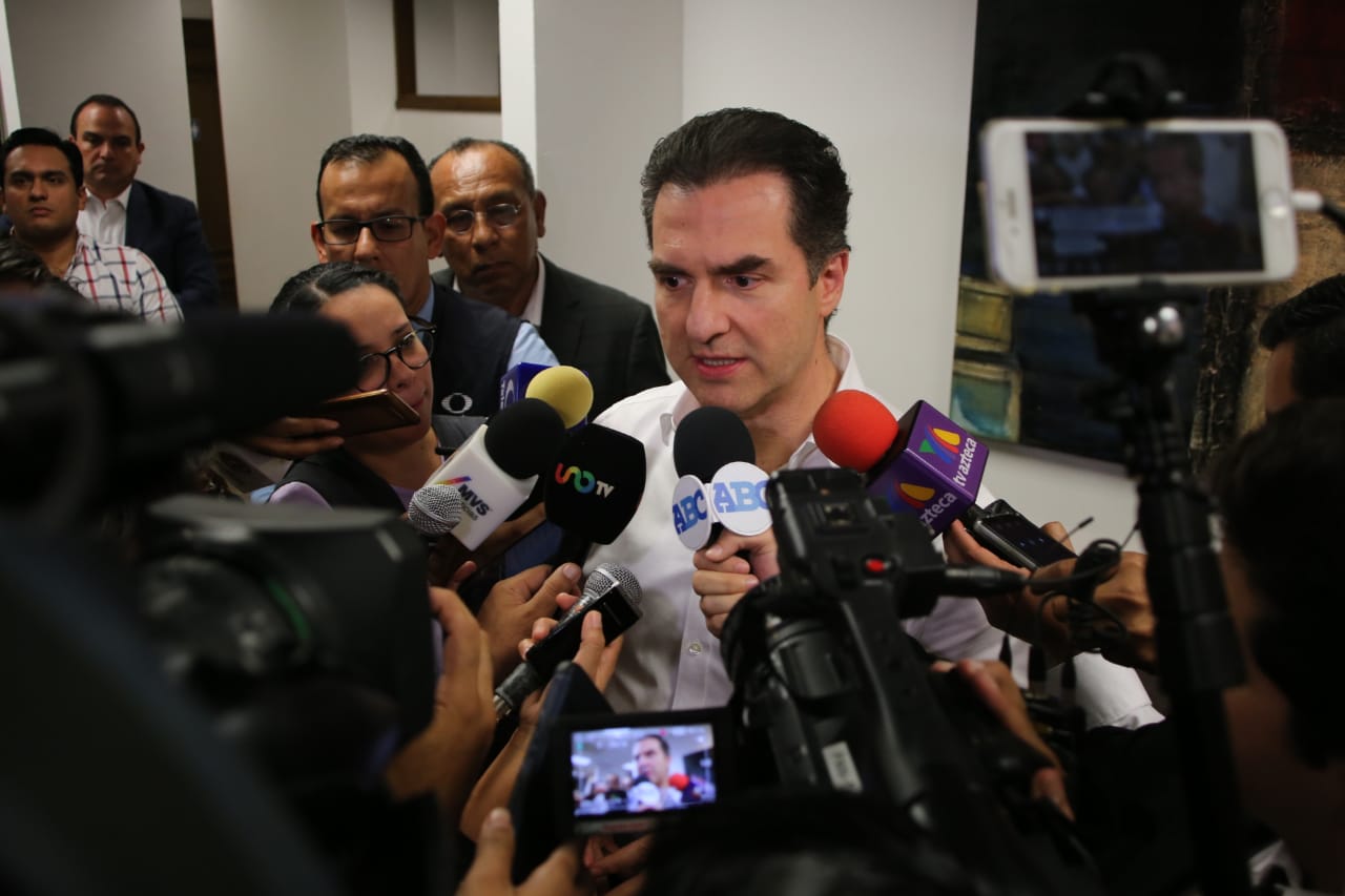 Adrián de la Garza Santos.