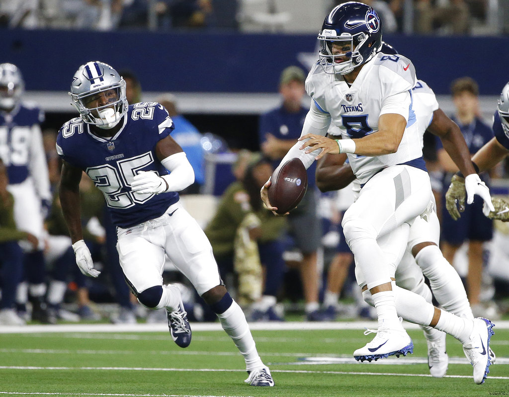 Marcus Mariota guió el triunfo de los Titans (AP)