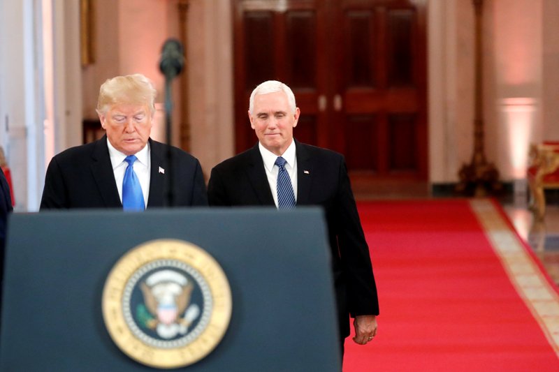 Trump y Pence durante una conferencia en la Casa Blanca.