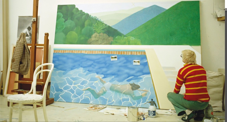 David Hockney en su estudio durante la elaboración del cuadro. (Christie's)