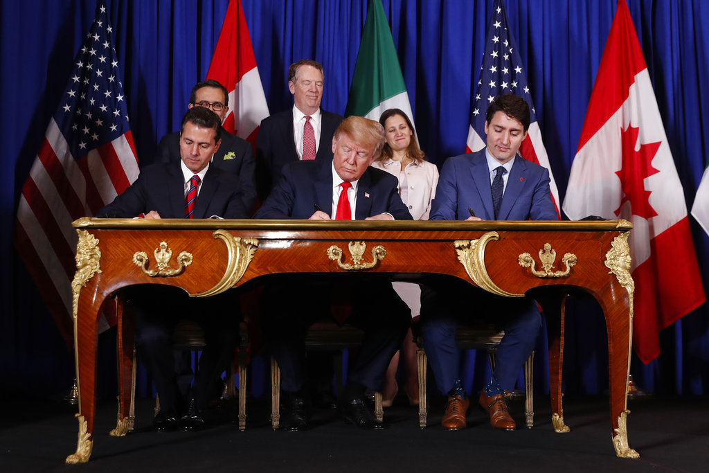 Los presidentes de México, Estados Unidos y Canadá firmaron el T-MEC. (AP)
