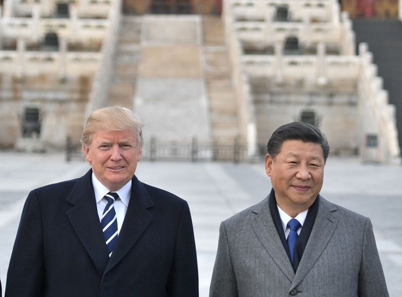 Donald Trump y Xi Jinping durante una reunión en Beijing en 2017. (AFP)