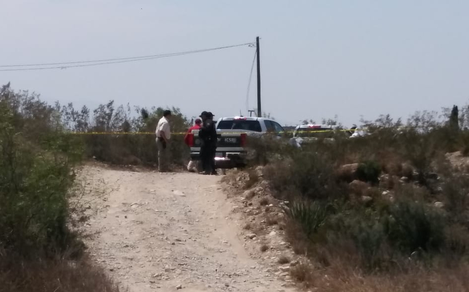 Localizan cuerpo envuelto en bolsas negras