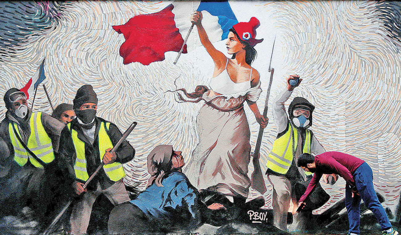"La libertad guiando al pueblo", de Delacroix, fue reinterpretada por el artista PBOY a partir de los "chalecos amarillos". (Reuters)