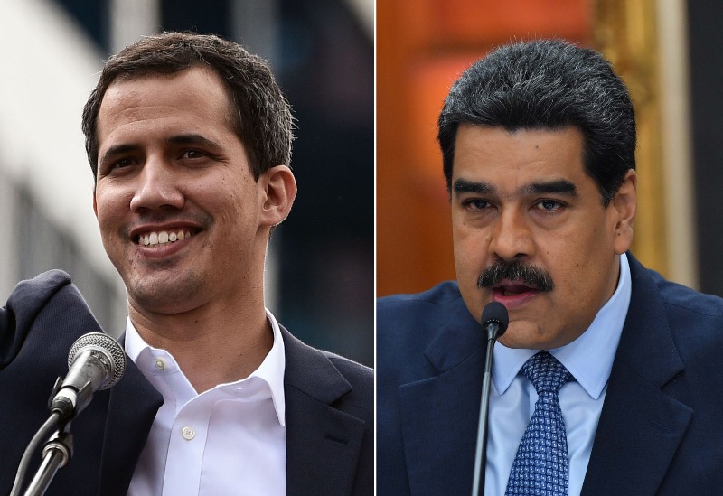 El autoproclamado ejecutivo interino, Juan Guaido, y Nicolás Maduro.
