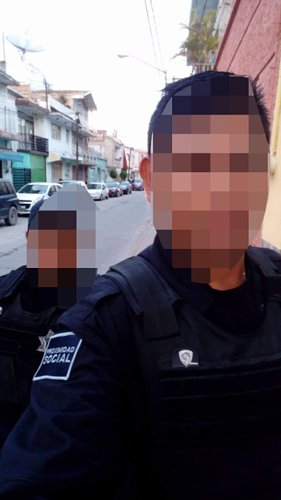 Policía fallecido y lesionada