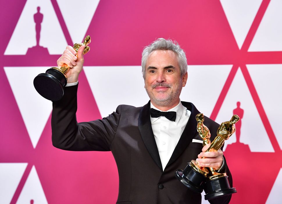 Alfonso Cuarón se llevó tres Oscar esta noche, por su película 'Roma' (AFP).