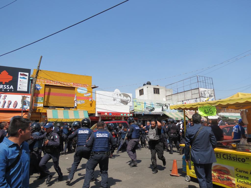 Enfrentamiento armado en el Mercado Morelos, Puebla (Andrés Sánchez)
