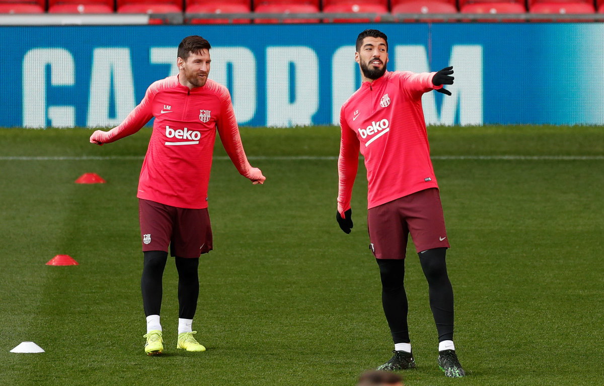 Lionel Messi y Luis Suárez durante un entrenamiento con el Barcelona (Reuters)