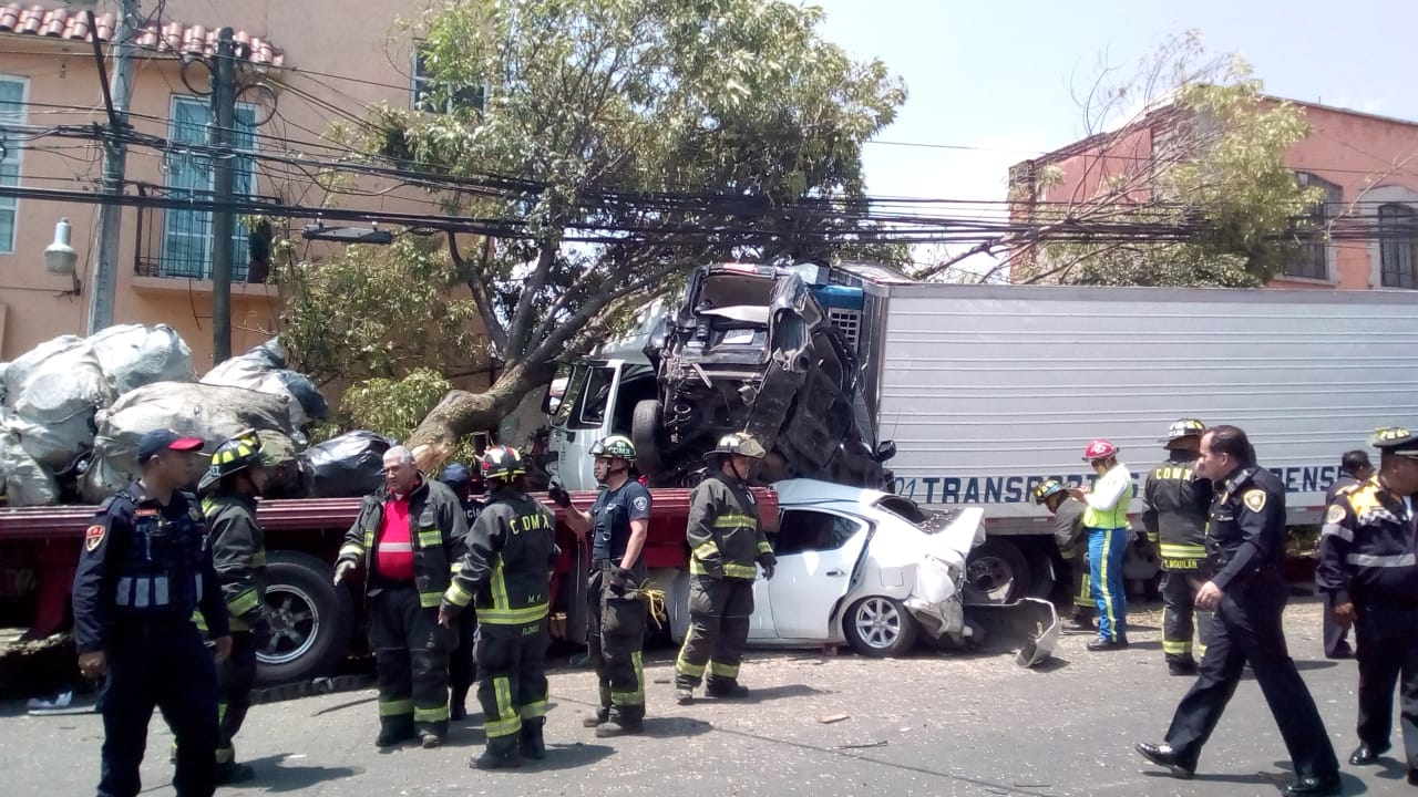 El choque dejó 14 lesionados además de los cuatro fallecidos.