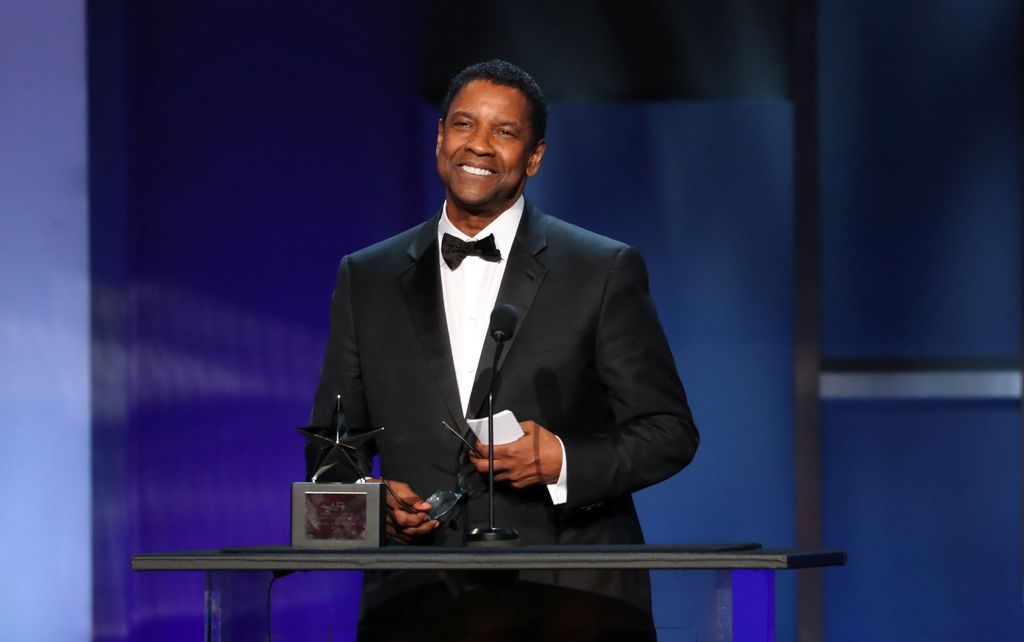 Hollywood celebró los 50 años de trayectoria de Washington. (AFP)