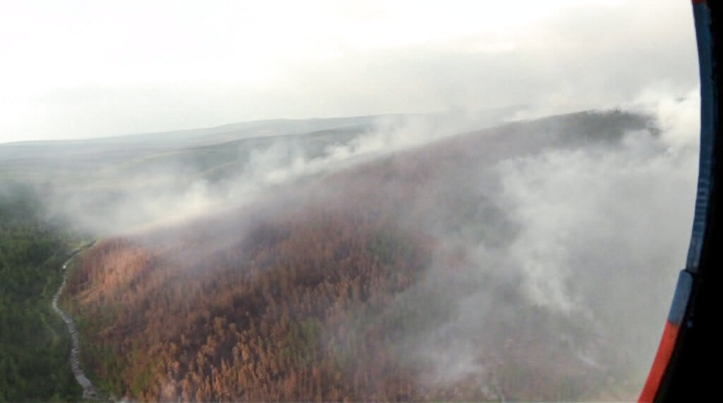 Se espera lluvia en algunas de las zonas afectadas, según los meteorólogos, pero no suficiente para apagar los incendios. AP