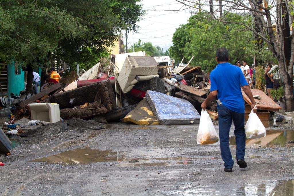 En San Nicolás de los Garza más de 30 casas resultaron afectadas por el desbordamiento del arroyo Topo Chico. (Cuartoscuro)