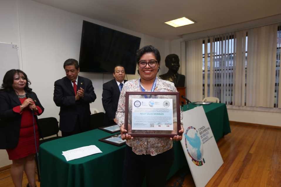 Nelly Salas, fotógrafa de Milenio, premiada por la CIDHPDA (Javier Ríos).