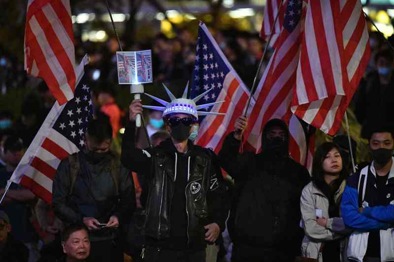 La Oficina de Enlace de Pekín en Hong Kong condenó la "conducta repugnante" de Washington. (AFP)