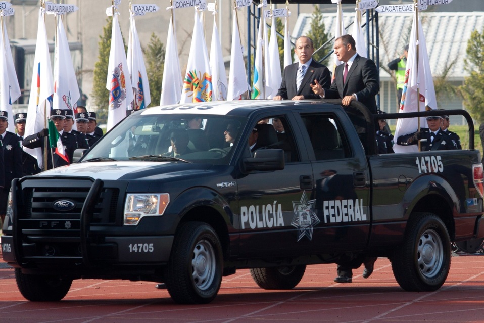 Felipe Calderón y Genaro García Luna en un junio de 2012 durante la ceremonia por el Día del Policía. (Cuartoscuro | Archivo)