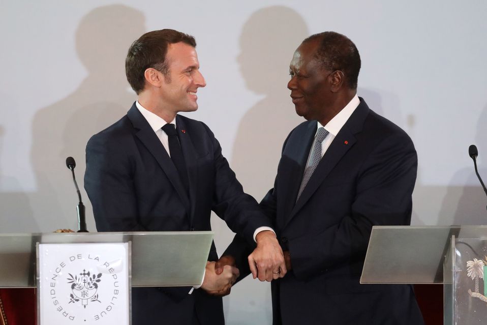 Emmanuel Macron y Alassane Ouattara. (AFP)