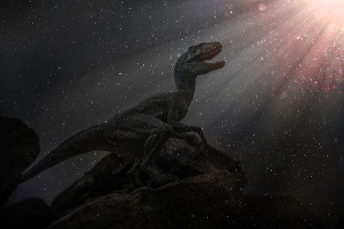 Un tiranosaurio de frente al meteorito (Shutterstock).