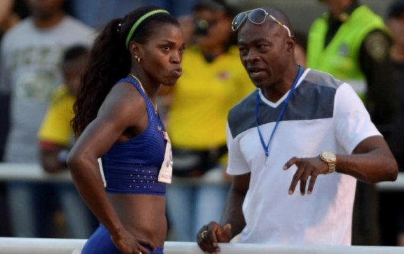 Caterine Ibargüen y el entrenador Ubaldo Duany terminaron con su relación laboral (AFP)
