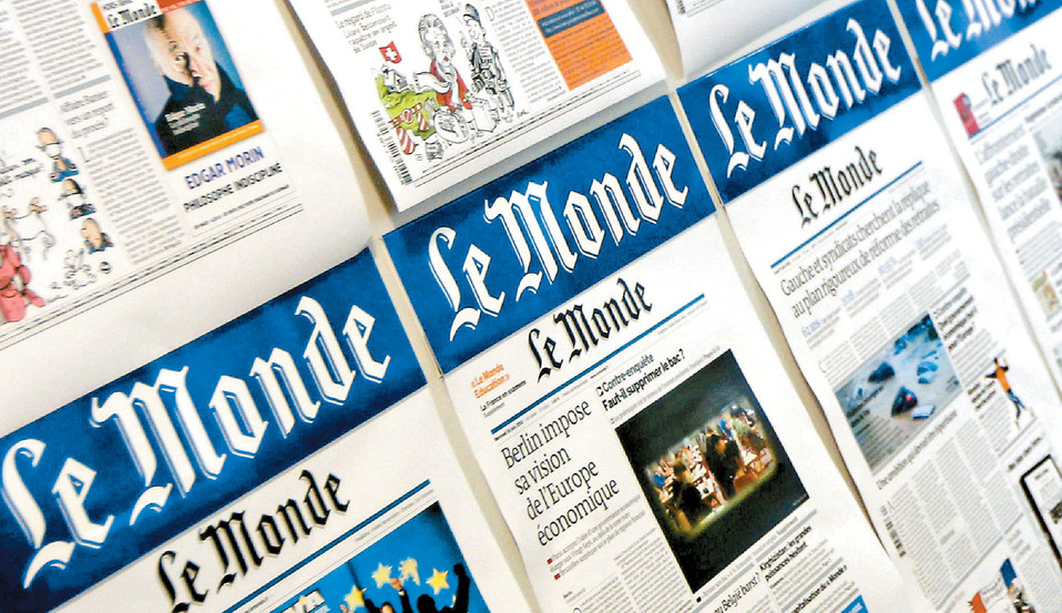Las pláticas preliminares, con los diarios galos "Le Figaro" y "Le Monde". (AP)