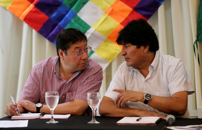 Luis Arce y Evo Morales. (AFP)