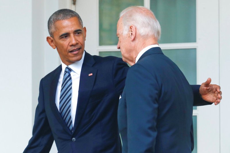 El presidente Barack Obama, acompañado por Joe Biden, durante 2016. (AP)