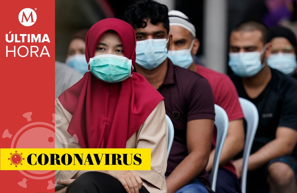 Coronavirus en el mundo, 15 de abril: en la imagen, habitantes de Malasia esperan los resultados de sus pruebas de covid-19 (AP).