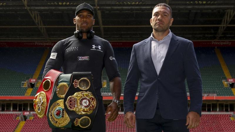 Anthony Joshua y Kubrat Pulev (AFP)
