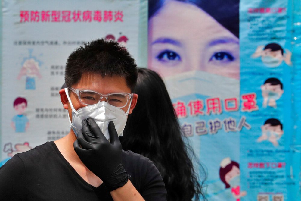 El número total de infectados activos en China es de 415. (AP)