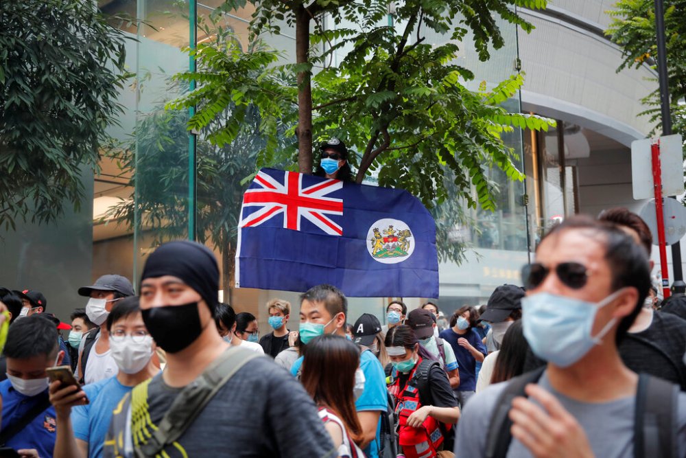 La propuesta del Reino Unido concierne a 2,9 millones de los 7,5 millones de habitantes de Hong Kong. (AP)