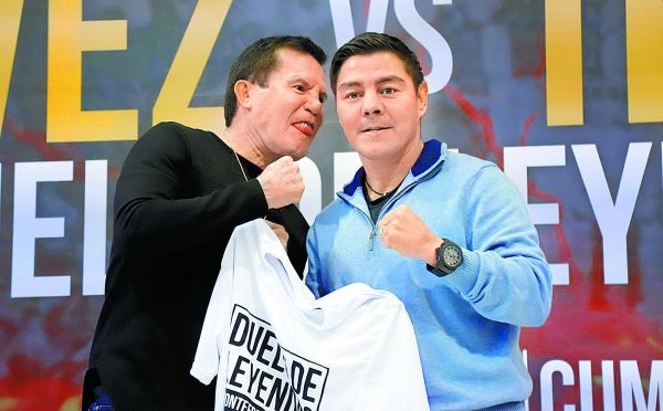 Son buenos amigos, pero con los guantes se transforman. Zanfer