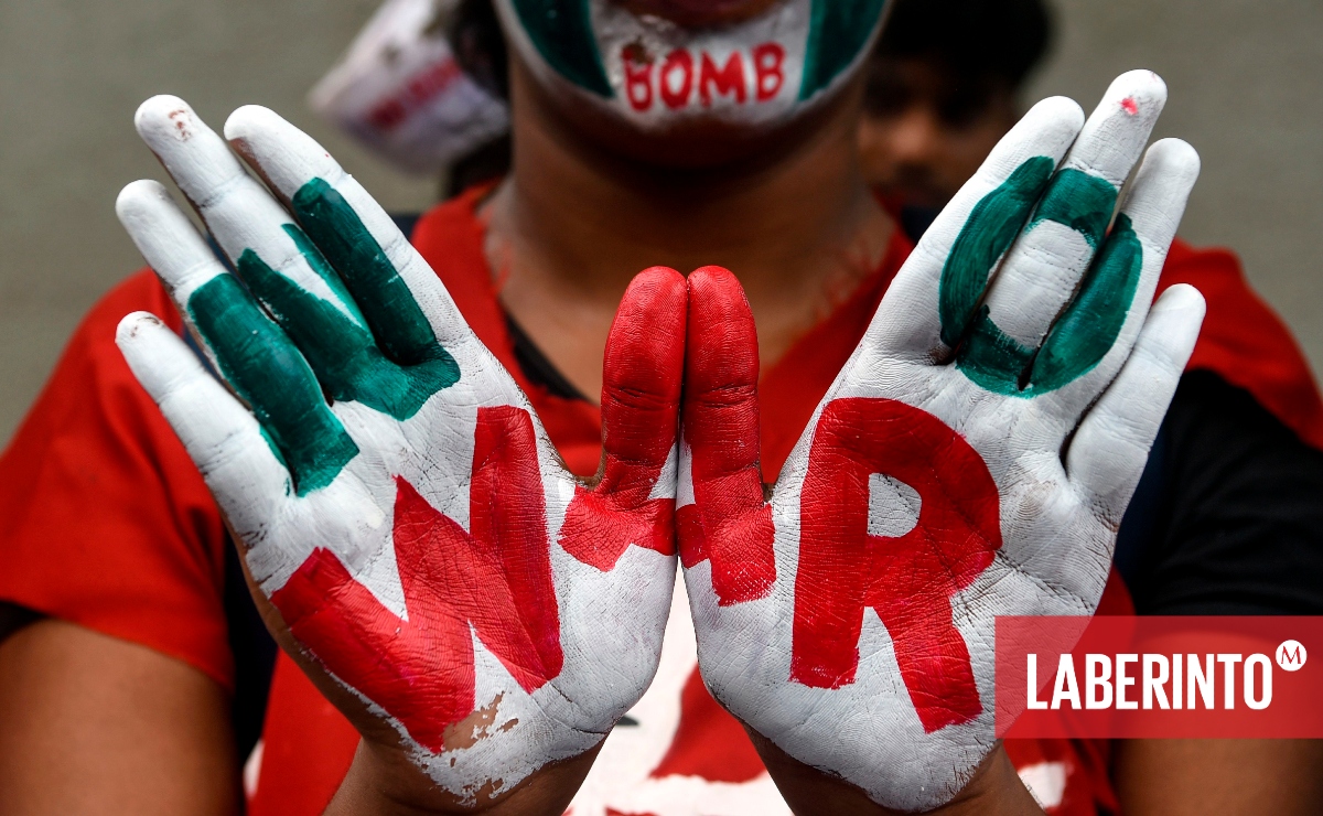 Una manifestante antibélica. (Foto: Punit Paranje | AFP)