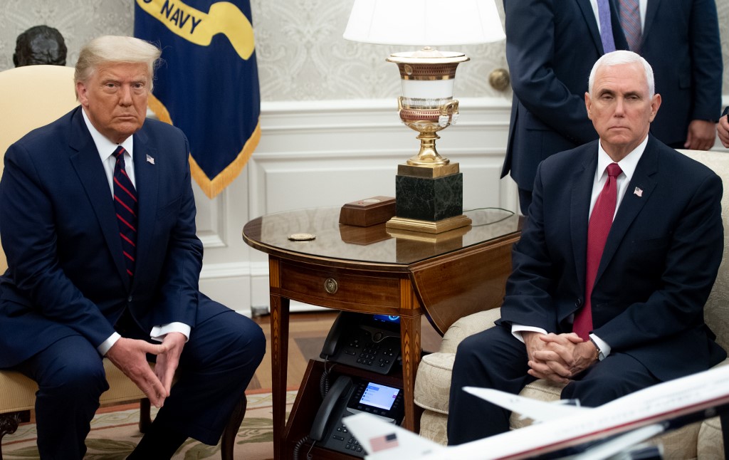 Donald Trump y Mike Pence se mantienen como la fórmula presidencial republicana. (AFP)