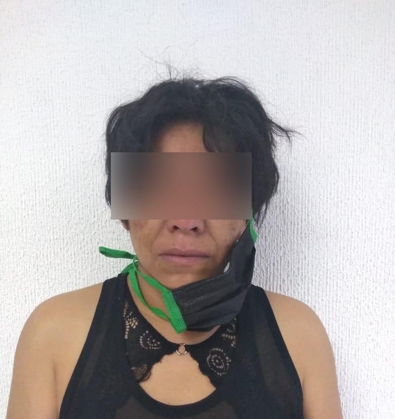 Agentes detuvieron a María de los Ángeles "C.",  por presuntamente intentar pagar con un billete falso.  (Especial)