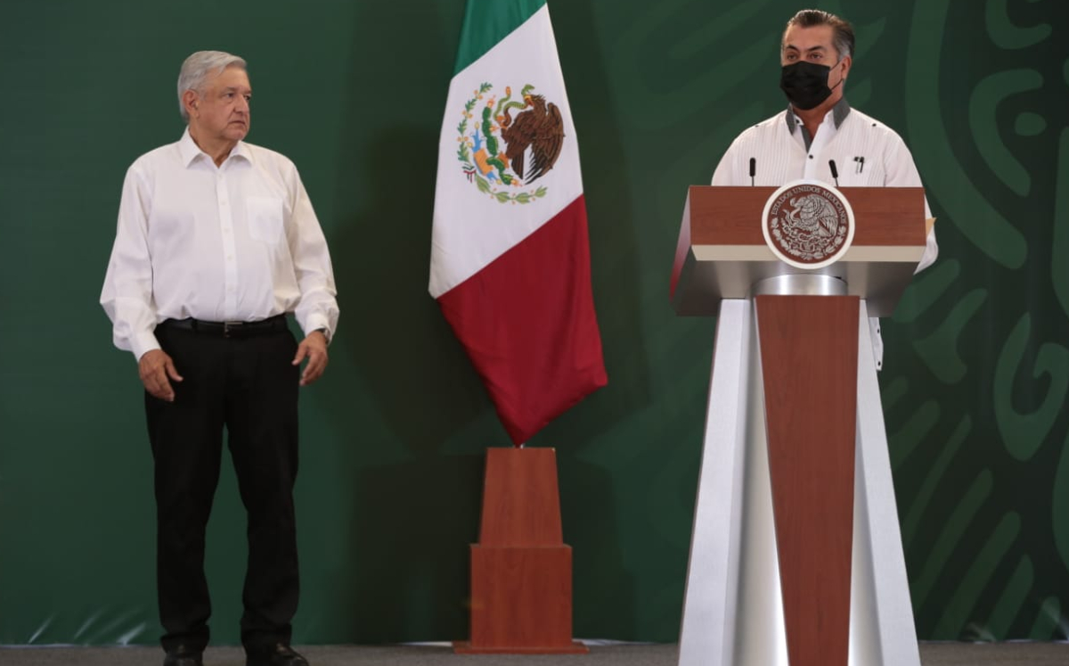 López Obrador junto al gobernador Rodríguez Calderón. (Jesús Quintanar)