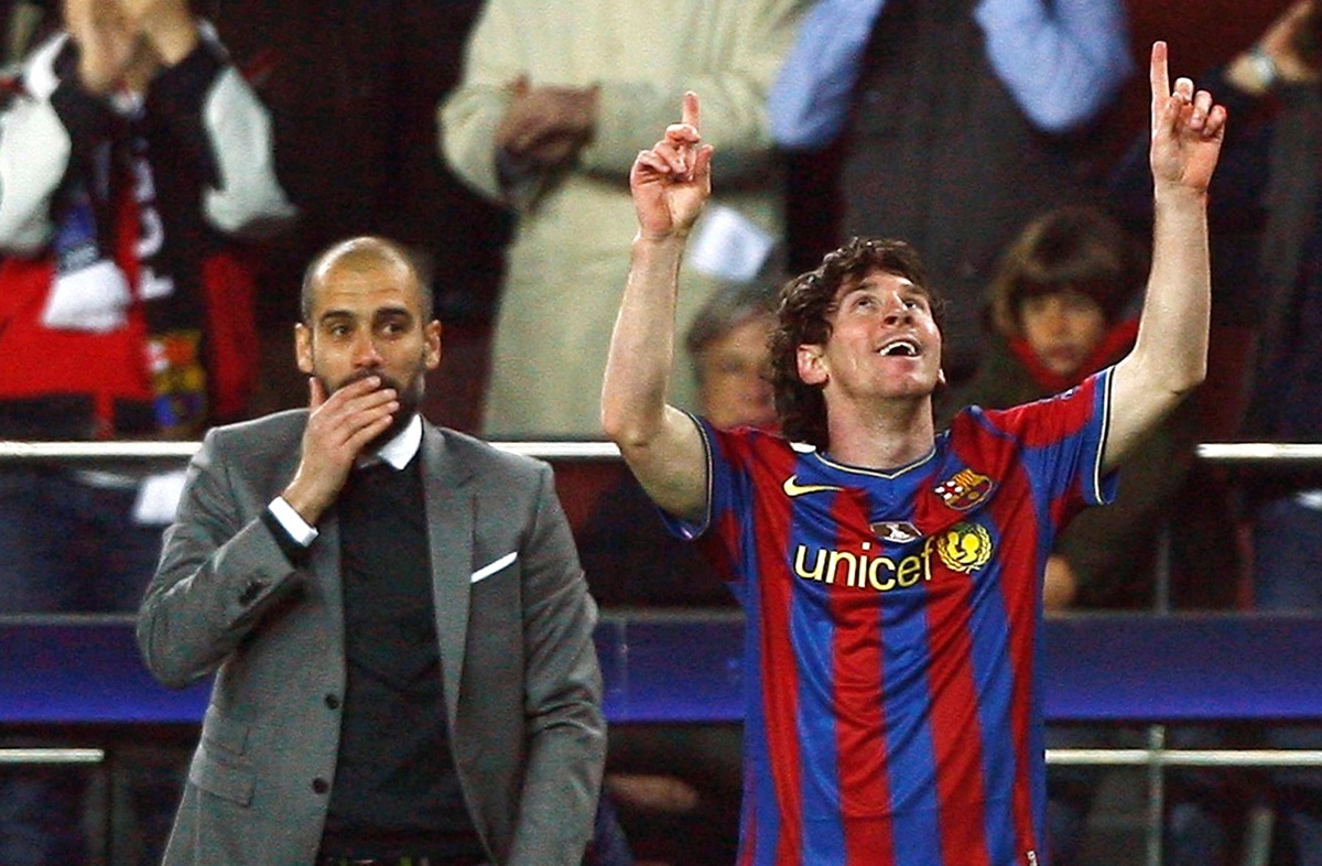 Pep Guardiola y Lionel Messi (Reuters)