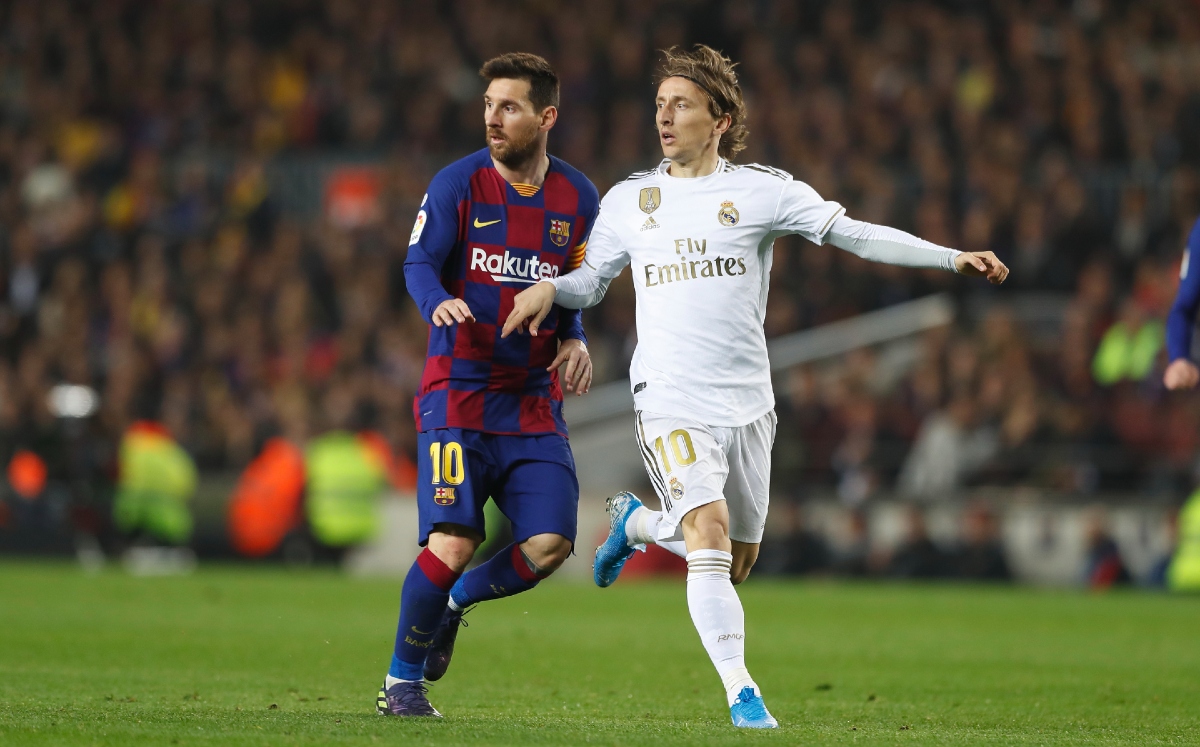 Luka Modric y Lionel Messi (Reuters)