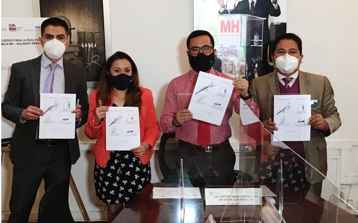 Firma del convenio entre la alcaldía Miguel Hidalgo y WalMart. (Especial)