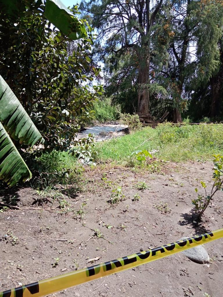 Elementos de la Policía Municipal y la Guardia Nacional acordonaron la orilla del afluente. (Especial)