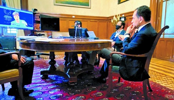 El secretario en reunión virtual con la titular del FMI el 16 de octubre. Especial