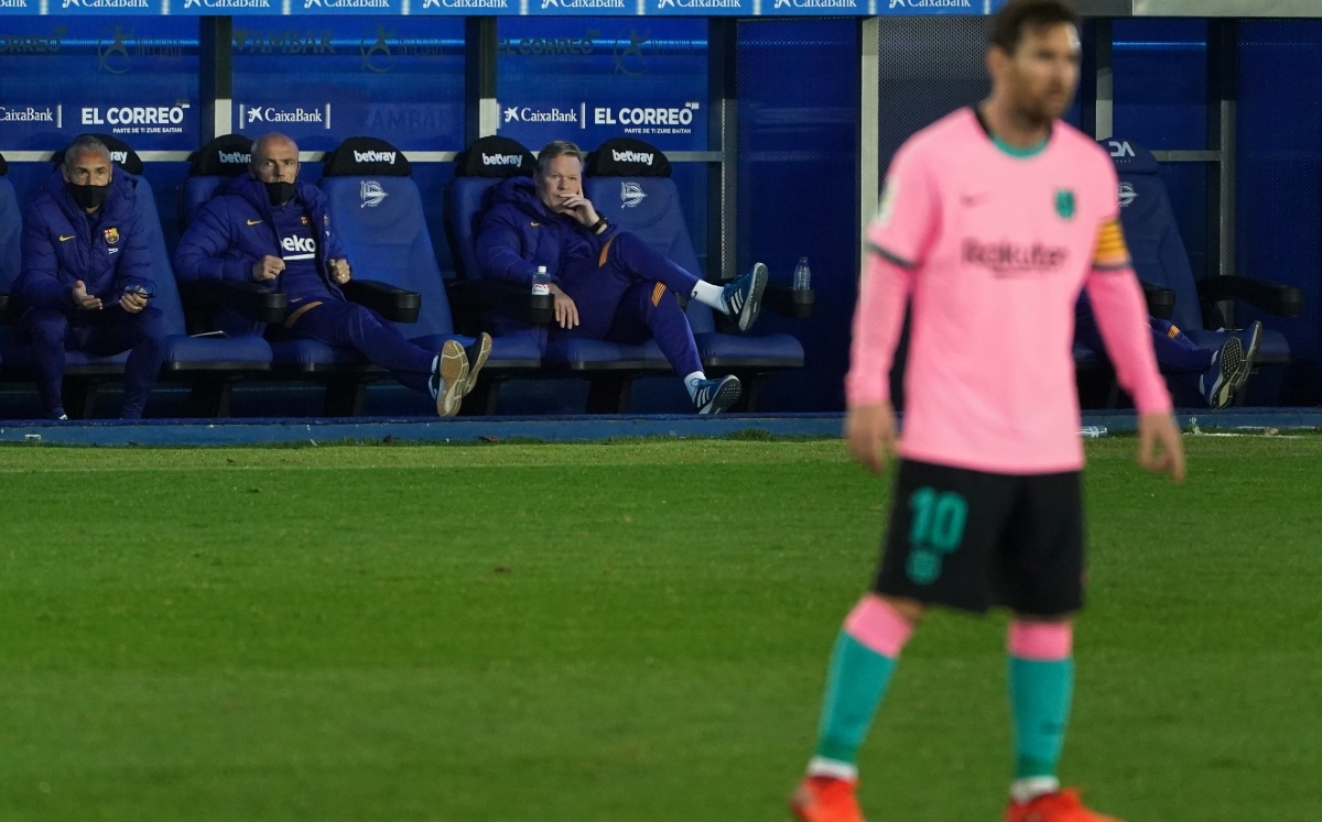 Ronald Koeman y Lionel Messi (AFP)