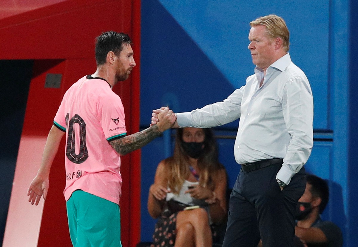 Ronald Koeman y Lionel Messi (Reuters)