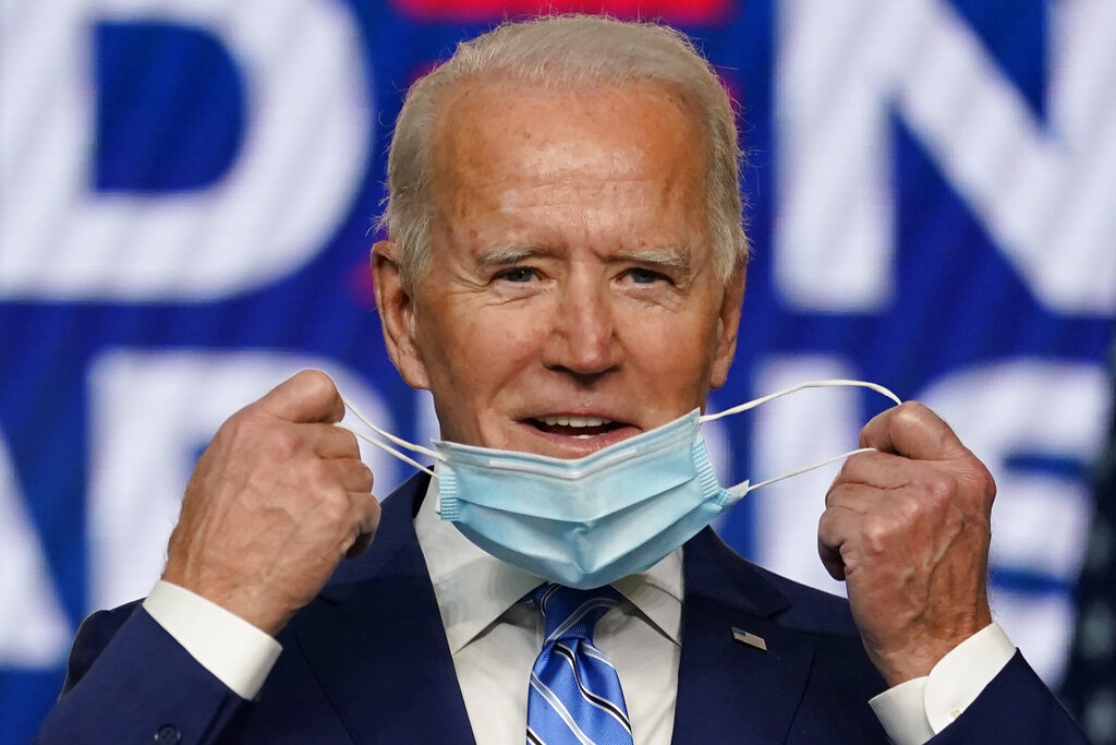 Enfrentar la pandemia de coronavirus es una de las prioridades del virtual ganador Joe Biden. (AP)