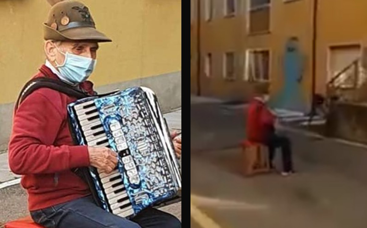 Abuelito toca acordeón afuera de hospital en donde está su esposa por covid-19. (Captura)