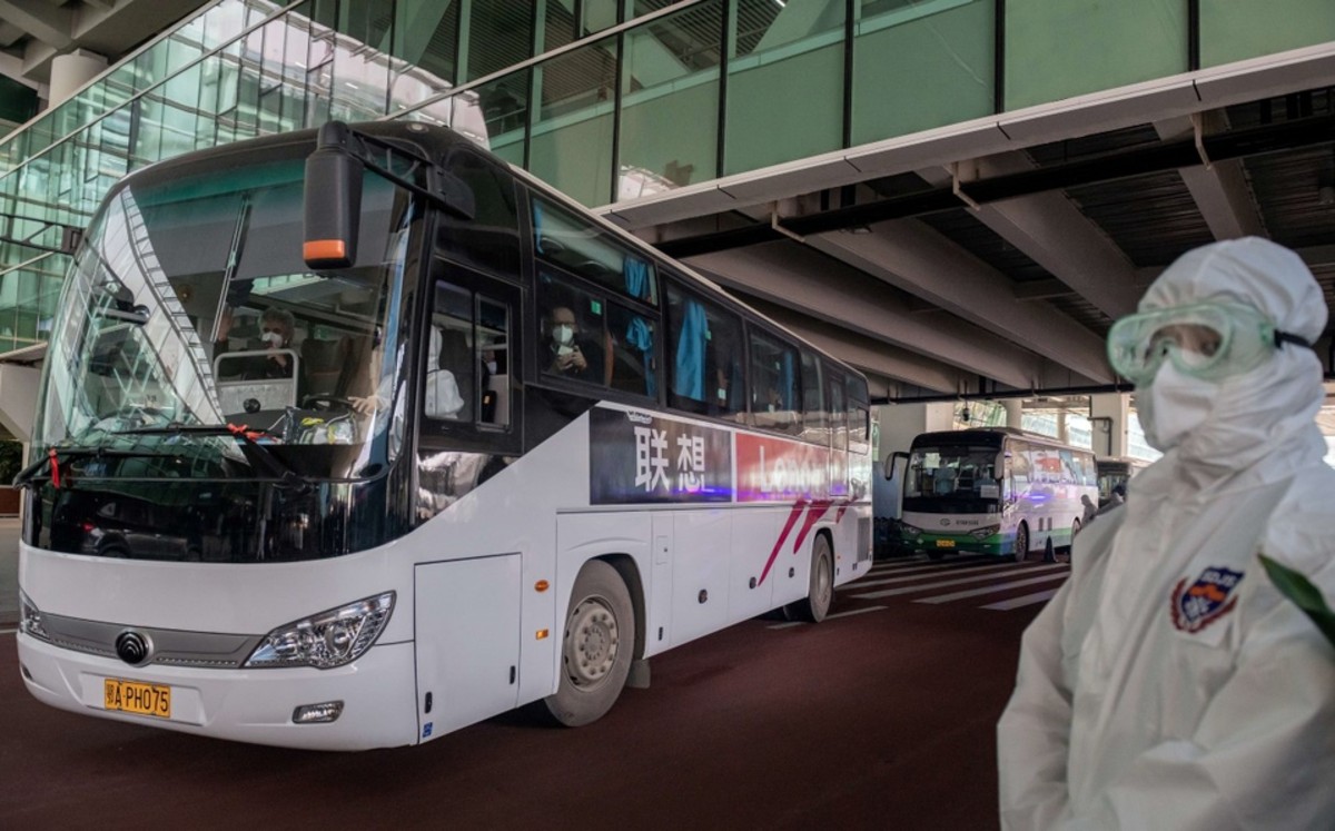 En China, expertos de la OMS llegan a Wuhan para investigar origen de coronavirus